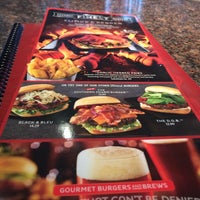 Photo taken at Red Robin Gourmet Burgers and Brews by Rodney B. on 1/5/2015