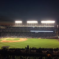 Photo taken at Wrigley Rooftops 3639 by K K. on 10/22/2015