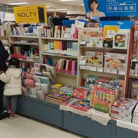 Photo taken at 文教堂書店 by Kenny E. on 12/24/2018