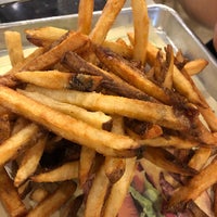 Photo taken at BurgerFi by Andrew W. on 1/3/2019