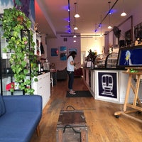 Photo taken at Standing Passengers Coffeehouse by Andrew W. on 6/18/2021