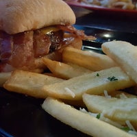 Photo taken at Red Robin Gourmet Burgers and Brews by Whitney on 8/31/2016