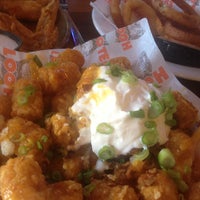 Photo taken at Hooters of Santa Monica by Bougrelon on 4/10/2013