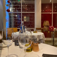 Photo taken at Il Convivio by Peter B. on 12/23/2019