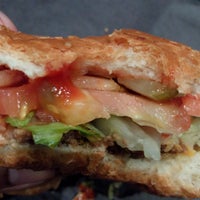 Photo taken at Burger Stomper Gourmet Burger &amp;amp; Milkshake Bar by Thiraya N. on 12/23/2014