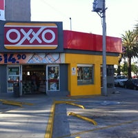 Photo taken at OXXO by Gabo R. on 10/23/2011
