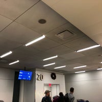 Photo taken at Gate 20 by Cosmo C. on 1/3/2018