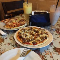 Photo taken at Artisans Pizza by qistina f. on 2/23/2015