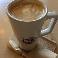 Photo taken at Mystic Coffee Roaster by Kathleen on 5/20/2017
