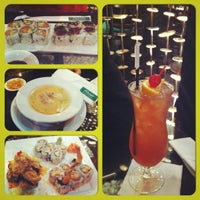 Photo taken at Wasabi Asian Plates &amp; Sushi Bar by Beiley K. on 10/13/2012