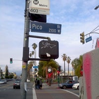 Photo taken at 603 Bus Stop, Hoover and Pico by Paul K. on 12/23/2012