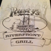 Photo taken at Rusty&amp;#39;s Riverfront Grill by sarah b. on 3/7/2015