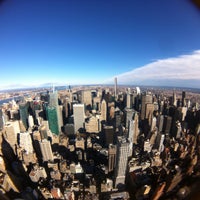 Photo taken at Empire State Building by Alwi I. on 12/25/2014
