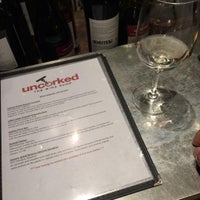 Photo taken at Uncorked The Wine Shop by Nicholas C. on 10/17/2015