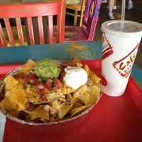 Photo taken at Cafe Rio Mexican Grill by Melissa D. on 4/13/2013