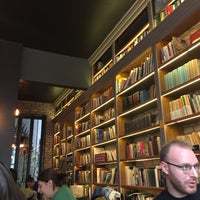 Photo taken at Minoa Bookstore &amp;amp; Café by Burc on 2/11/2017