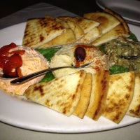 Photo taken at Zorba&#39;s Greek Cafe by Josh K. on 12/9/2012