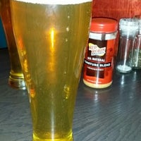 Photo taken at Red Robin Gourmet Burgers and Brews by John T. on 3/3/2015