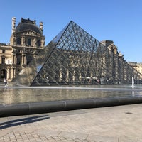 Photo taken at Louvre Pyramid by D B. on 5/6/2019