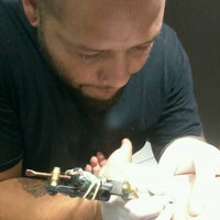 Photo taken at Tattoo Da Vila by Thais M. on 10/6/2012