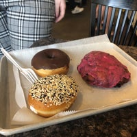Photo taken at Revolution Doughnuts &amp;amp; Coffee by Brett P. on 7/14/2019