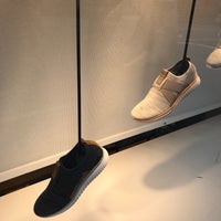 Photo taken at Cole Haan by Adrian L. on 7/28/2018