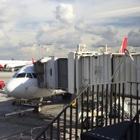 Photo taken at Gate 37B by Adrian L. on 12/17/2014