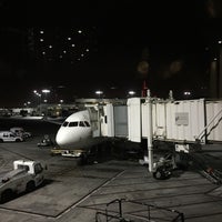 Photo taken at Gate 37B by Adrian L. on 10/27/2014