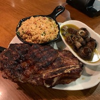 Photo taken at Outback Steakhouse by Adrian L. on 12/14/2018
