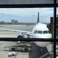 Photo taken at Gate 59 by Adrian L. on 7/27/2017