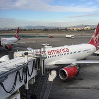Photo taken at Gate 33B by Adrian L. on 12/28/2015