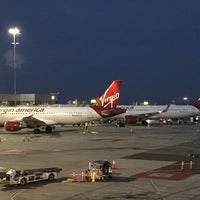 Photo taken at Gate D4 by Adrian L. on 4/25/2018