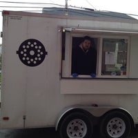 Photo taken at Grind Gourmet Burger Truck by Chuck C. on 12/1/2013