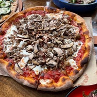 Photo taken at Tino&amp;#39;s Artisan Pizza Co. by Cat C. on 6/2/2021