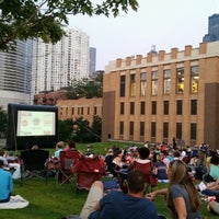 Photo taken at Fulton River District- Movies In The Park by Balu T. on 7/22/2014
