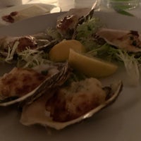 Photo taken at The Frisky Oyster by Adam B. on 10/5/2019