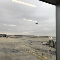 Photo taken at Gate T2 by Kevin B. on 1/1/2018