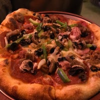 Photo taken at The Rock Wood Fired Pizza by Frozen T. on 3/1/2022