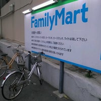 Photo taken at FamilyMart by Yuji I. on 3/29/2013