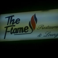 Photo taken at The Flame Steakhouse by Johnathan W. on 9/14/2012