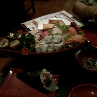 Photo taken at Flying Sushi by Marcela M. on 11/25/2012