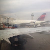 Photo taken at Gate 58A by Shane K. on 1/12/2014