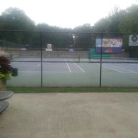 Photo taken at Washington Park Tennis Center by Tess V. on 9/30/2012