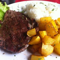 Photo taken at TBone Restaurante Steak Bar by Fernao V. on 11/8/2012