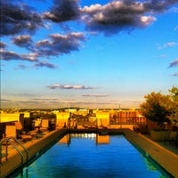 Photo taken at The Whitman Rooftop Pool by Erica E. on 9/15/2012