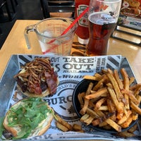 Photo taken at The Works Gourmet Burger Bistro by Drew S. on 8/30/2019