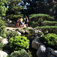 Photo taken at James Irvine Japanese Garden at the JACC by Nic D. on 8/9/2014