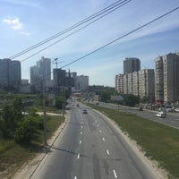 Photo taken at Октябрьский пешеходный мост by Валерия Ш. on 6/26/2015