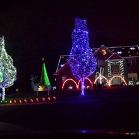 Photo taken at Our Dancing Lights by Christine G. on 12/1/2013