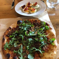 Photo taken at Brezza Cucina + Pizzeria by Lydia L. on 3/16/2019